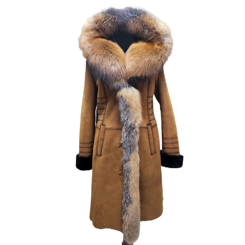 Chic, modern fashion for empowered women   Chantal's Tan Shearling coat with large fox fur hoodie and trim